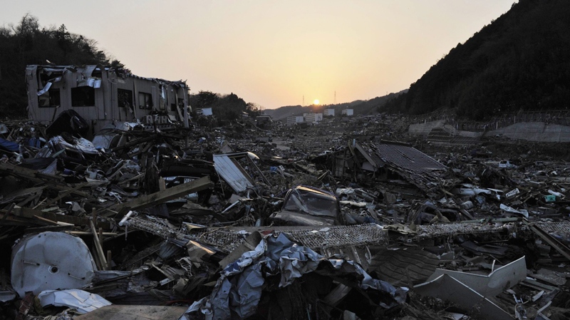 The sun goes down over the devastated town of Onagawa, northeastern Japan, Saturday, March 19, 2011 (AP / Kyodo News) 