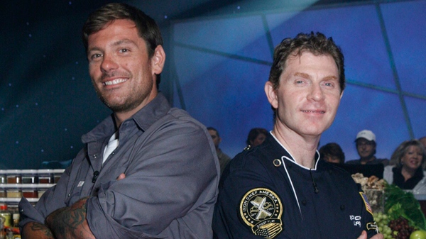 Montreal chef Chuck Hughes of TV's 'Chuck's Day Off,' left, and cooking superstar Bobby Flay on the set of 'Iron Chef America.'