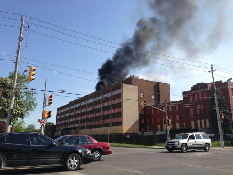 Fire officials say a blaze at the former Grace Hospital site appears to be on the roof of the building in Windsor, Ont. on Friday, May 17, 2013. (Sacha Long / CTV Windsor)