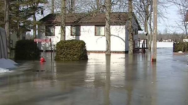 Flooding on the Rideau River caused water to surround about 20 homes on Hilly Lane, near Kemptville, Sunday, March 20, 2011.