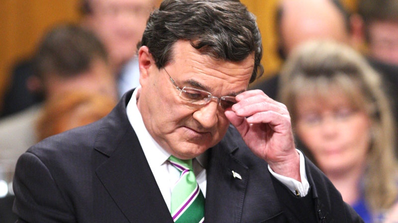 Minister of Finance Jim Flaherty adjusts his glasses as he delivers the federal budget in the House of Commons on Parliament Hill in Ottawa, Tuesday March 22, 2011. (Sean Kilpatrick / THE CANADIAN PRESS)