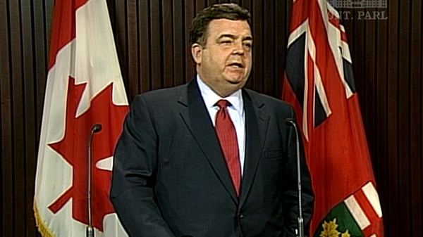 Ontario Finance Minister Dwight Duncan comments on the federal budget during a press conference at Queen's Park in Toronto, Tuesday, March 22, 2011.