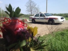 A Hamilton Police Service cruiser sits at the North Dumfries, Ont., farm owned by Dellen Millard on Tuesday, May 21, 2013. (Kevin Doerr / CTV Kitchener)