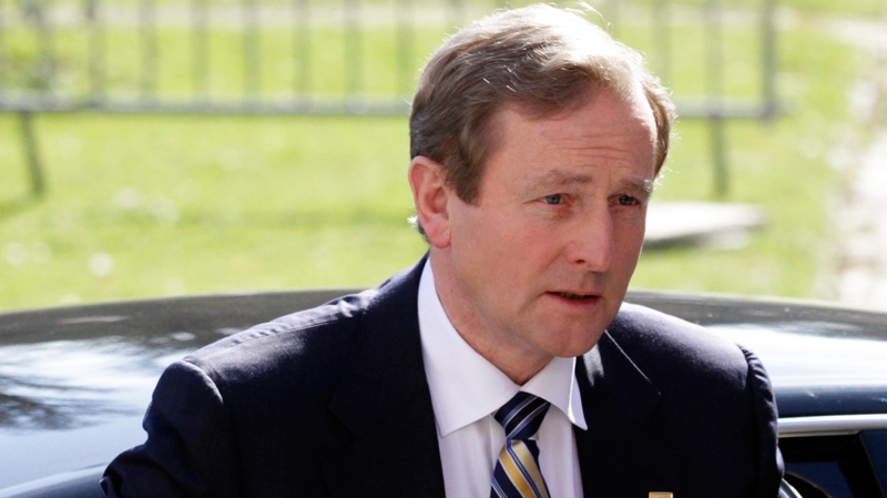 Irish Prime Minister Enda Kenny arrives for a meeting of the European People's Party on the sidelines of an EU summit in Brussels, Thursday, March 24, 2011. (AP / Yves Logghe)