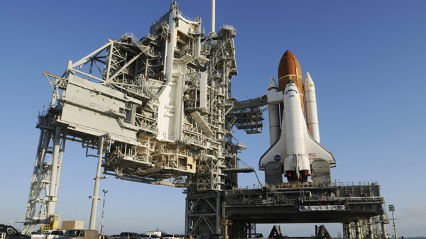 The space shuttle Endeavour sits on launch pad 39A on Friday, March 11, 2011. (AP Photo/Florida Today, Michael R. Brown)
