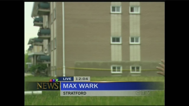 Police tape can be seen at an apartment building a day after a stabbing took place in Stratford, Ont. on Tuesday, May 28, 2013.
