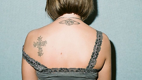 Mark Twitchell's ex-girlfriend Traci Higgins was asked during his first-degree murder trial about her two tattoos, one of which she said Twitchell helped her design in 2001.
