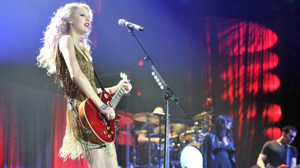 Taylor Swift performs on the last night of her European Tour at London's O2 Arena on Wednesday March 30, 2011. (AP / Mark Allan)