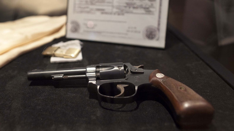 A hand gun that once allegedly belonged to mobster Bugsy Siegel is seen on display at the Mob Experience at the Tropicana, Monday, March 28, 2011, in Las Vegas. (AP Photo/Julie Jacobson)