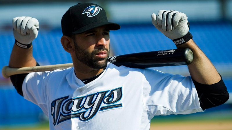 Toronto Blue Jays slugger Jose Bautista poses for a photograph during team picture day at baseball spring training in Dunedin, Fla., on Sunday, Feb. 20, 2011. (Nathan Denette / THE CANADIAN PRESS)     