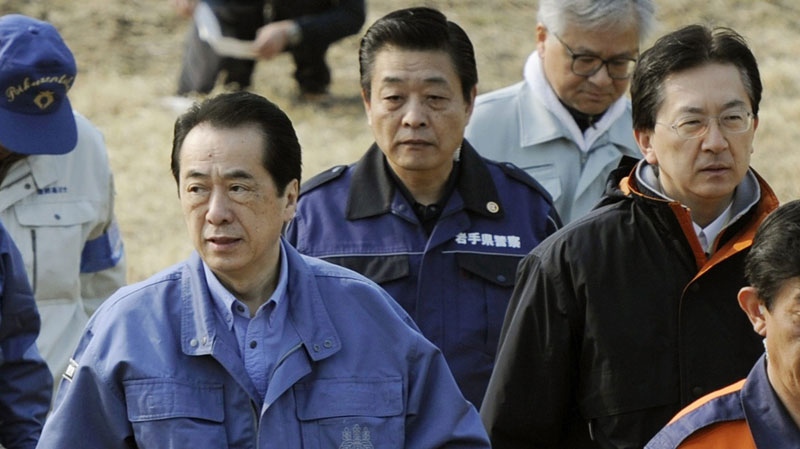 Japan's Prime Minister Naoto Kan arrives at Rikuzentakata, northern Japan to inspect the March 11 earthquake and tsunami devastated areas Saturday, April 2, 2011. (AP / Kyodo News) 