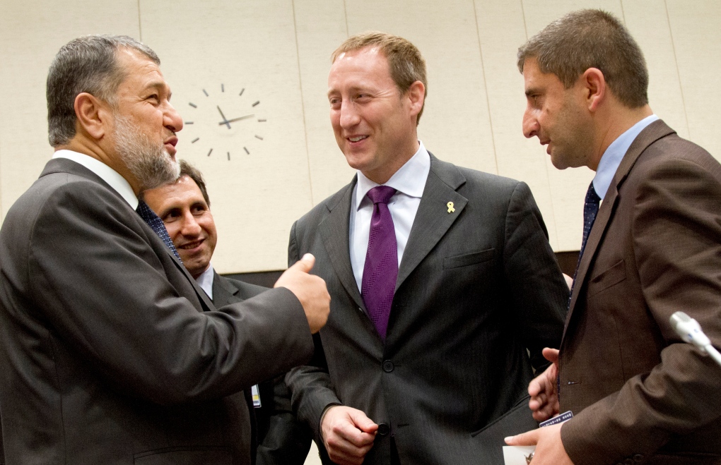 Defence Minister Peter MacKay, centre, in Brussels