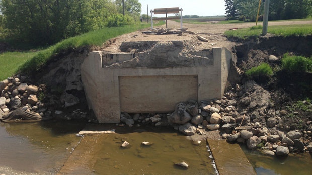 Crews were called to the crash at washed-out Road 142 North in the RM of Dauphin around 8 p.m. on June 4, 2013.