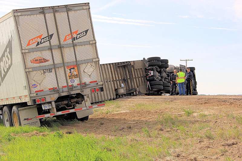 The eastbound lanes of the Trans-Canada Highway were closed near Indian Head after a semi with two trailers flipped onto its side Thursday morning. (Dan Loran)
