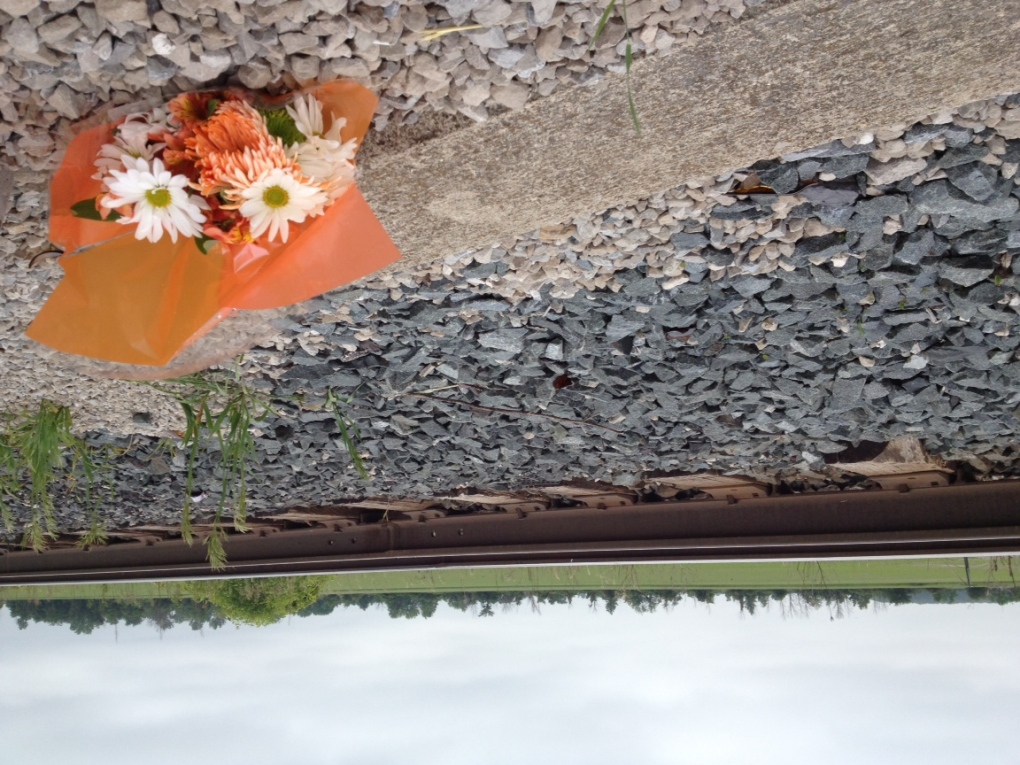 Flowers at train-truck crash Lakeshore