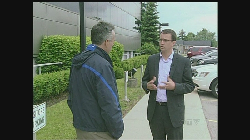 Lambton-Kent-Middlesex PC MPP Monte McNaughton, right, speaks with CTV in London, Ont. on Friday, June 7, 2013.