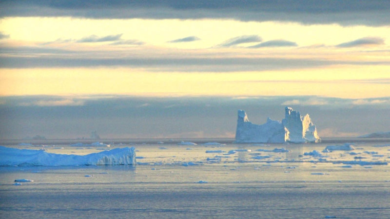 In this Thursday Aug. 18, 2005 file photo an iceberg is seen in Disko Bay, Greenland, above the arctic circle. (AP Photo/John McConnico, File)