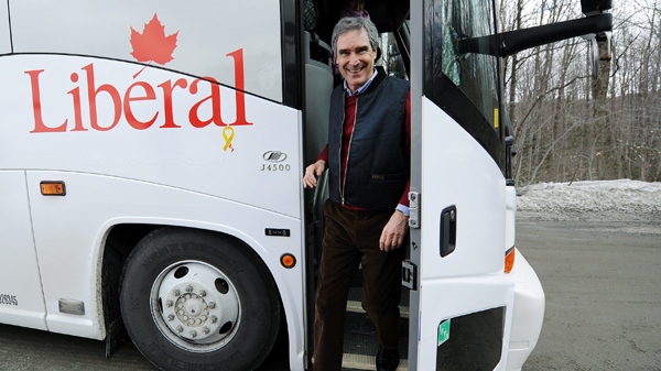 Liberal Leader Michael Ignatieff walks off the bus to attend an event at a fire station during a campaign stop in Orford , Que., on Wednesday, April 6, 2011. (Nathan Denette / THE CANADIAN PRESS)