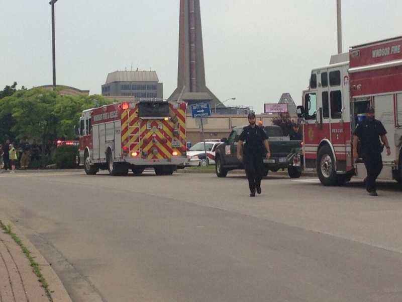 Windsor police and firefighters investigate a suspicious package at the Ambassador Bridge in Windsor, Ont., on Wednesday, June 12, 2013 (Stefanie Masotti / CTV Windsor)