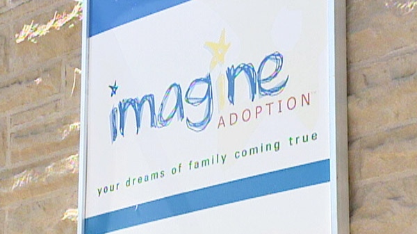 The sign for Imagine Adoption Inc. is seen in Cambridge, Ont. in this undated image taken from video.