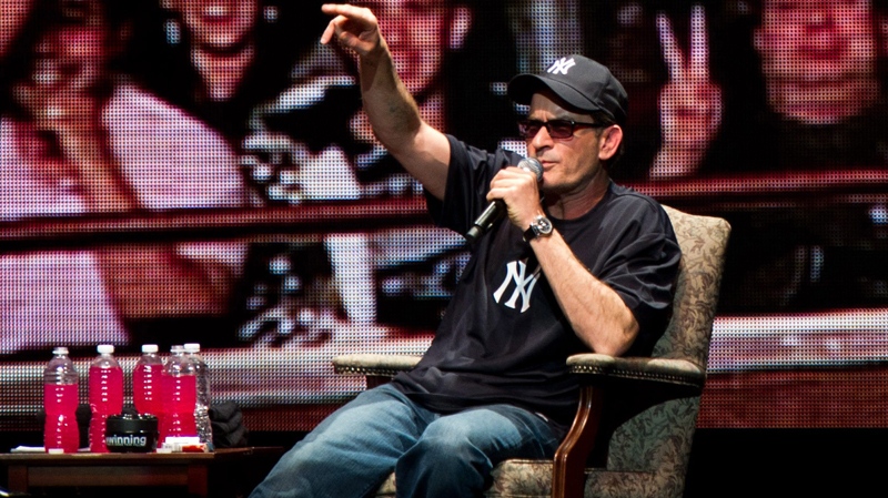 Charlie Sheen appears onstage at his 'Violent Torpedo of Truth' show at Radio City Music Hall in New York, Friday, April 8, 2011. (AP / Charles Sykes)