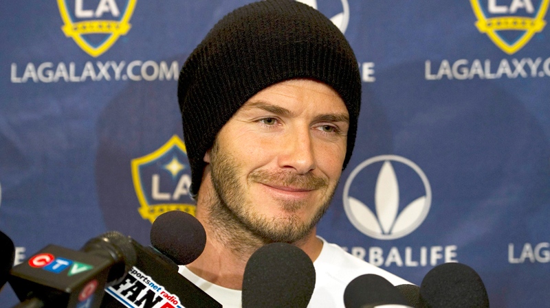Los Angeles Galaxy star player David Beckham smiles while speaking to the media during a press conference in Toronto on Tuesday, April 12, 2011. (Nathan Denette / THE CANADIAN PRESS)