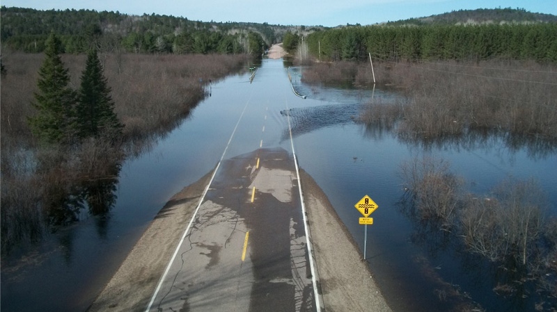 Water floods Kelly Lake Road at County Road 58 at the Indian River Bridge in the Upper Ottawa Valley, Tuesday, April 12, 2011. Viewer photo submitted by: Karen Wirth