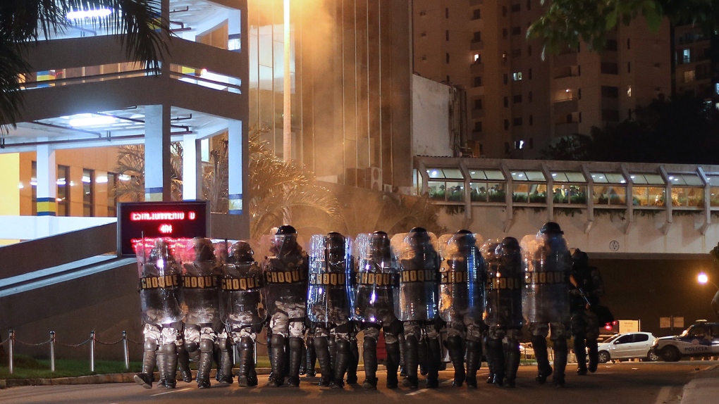 Riot police advance toward protesters, Brazil