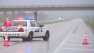An RCMP cruiser blocks the highway from Calgary to Canmore.
