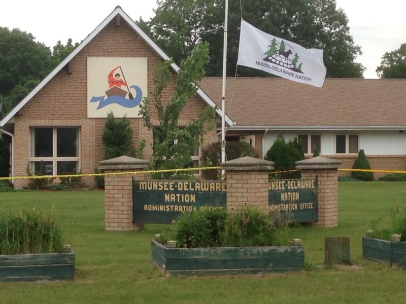 Police tape surrounds the Munsee-Delaware First Nation administration office, where a woman died in an overnight fire, Tuesday, June 25, 2013. (Gerry Dewan / CTV London)