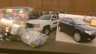 Police display drugs and other items seized during 'Project Newton' in Hamilton, Ont. on Thursday, April 14, 2011.
