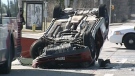 Two people were sent to hospital after a car flipped in a multi-vehicle crash on Woodroffe Avenue, Friday, April 15, 2011.