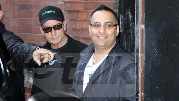 Charlie Sheen and Russell Peters outside Massey Hall in Toronto, Thursday, April 14, 2011. (Sean O'Neil for etalk)