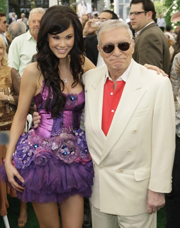 Hugh Hefner, right, and Playboy's 2008 Playmate of the Year Jayde Nicole, of Canada, pose for photographers during the Playmate of the Year luncheon at the Playboy Mansion in Los Angeles on Thursday, May 8, 2008. (AP / Matt Sayles)