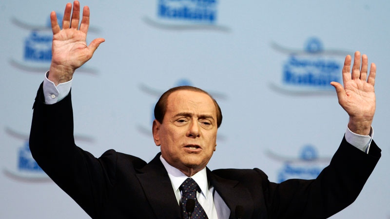 Italian Premier Silvio Berlusconi gestures as he addresses supporters during a People of Freedom party meeting in Rome, Saturday, April 16, 2011. (AP / Riccardo De Luca) 
