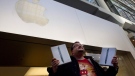Oren Lasko emerges from Apple store in Toronto's Eaton centre on Friday March 25, 2011. (Chris Young / THE CANADIAN PRESS)