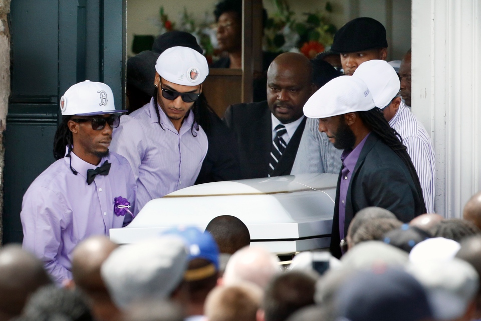 Pallbearers carry the casket of Odin LLoyd following a funeral ceremony at ...