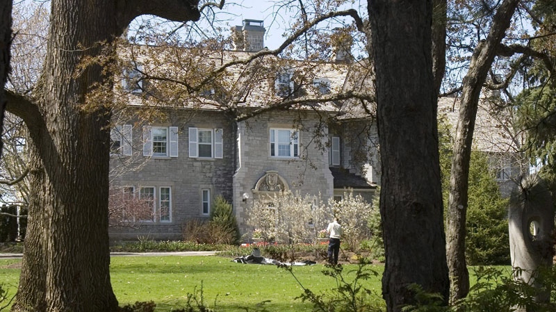 A gardener works on the grounds at the Prime Minister's residence at 24 Sussex Drive in Ottawa, Tuesday May 6, 2008. The stone residence that's supposed to house the prime minister in regal splendour is a drafty, outmoded plumbing nightmare that would take $10 million to fix, says Auditor General Sheila Fraser. (THE CANADIAN PRESS/Tom Hanson)