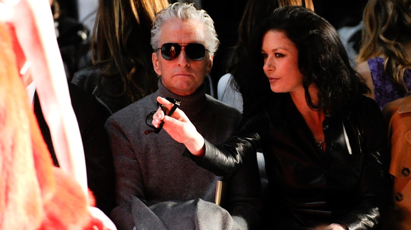 Michael Douglas and Catherine Zeta-Jones attend the Michael Kors Fall 2011 fashion show during Mercedes-Benz Fashion Week on Wednesday, Feb. 16, 2011 in New York. (AP / Evan Agostini)