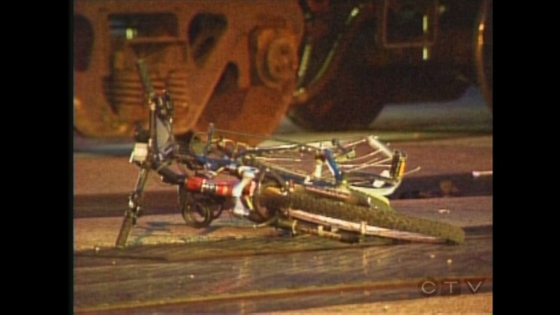 A bicycle sits on the railroad tracks after a fatal collision with a train in London, Ont. on Wednesday, July 3, 2013.