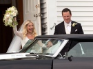 Toronto Maple Leafs captain Dion Phaneuf and actress Elisha Cuthbert head from their wedding at St. James Catholic Church in Summerfield, P.E.I. on Saturday, July 6, 2013. (Andrew Vaughan / THE CANADIAN PRESS)