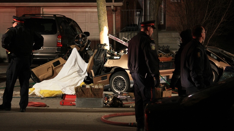 Peel police work at the scene of the fatal crash in Mississauga Wednesday night, April 20, 2011. (Tom Stefanac / CTV News)