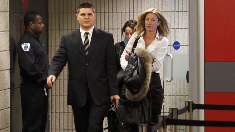 Allana Henderson, the estranged wife of former NHL player Vincent Damphousse, leaves the courtroom after being charged with assault with a weapon and theft, Wednesday, April 20, 2011 in Montreal. (THE CANADIAN PRESS/Ryan Remiorz)