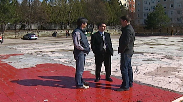 From left, Campus Court business owners Kevin Chung, Benny Afrouzi and Jerry Smith discuss the damage in Waterloo, Ont. on Thursday, April 21, 2011.