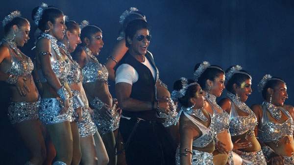 Bollywood actor Shahrukh Khan, center, performs during the opening ceremony of the Indian Premier League (IPL) in Chennai, India, Friday, April 8, 2011. The fourth edition of the world's richest cricket tournament will run until May 28. 