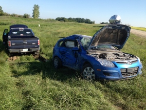 Two people were taken to hospital after a collision between a car and a pickup truck on Highway 48 just southeast of White City on Wednesday morning.