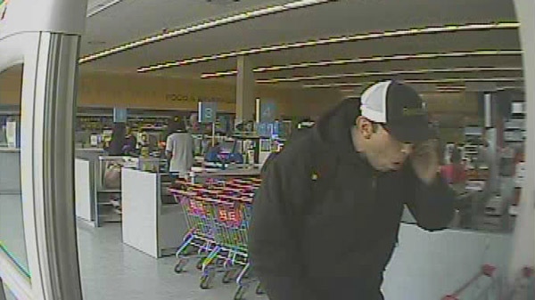 A suspect sought in connection with a theft investigation at Shoppers Drug Mart in Cambridge, Ont. is seen in this image released by the Waterloo Regional Police Service.