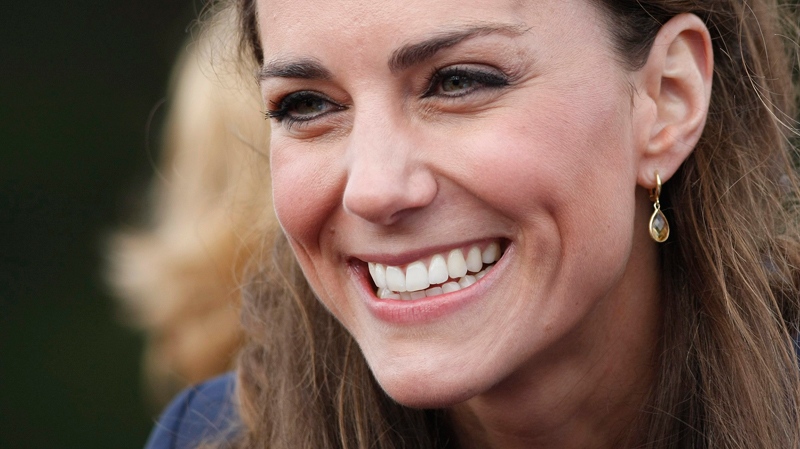 Kate Middleton reacts to the crowd, during a visit to Witton County Park, Darwen, near Blackburn, England Monday, April, 11, 2011. (AP / Alastair Grant)
