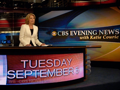 This photo, released by CBS News, shows Katie Couric, anchor and managing editor of the "CBS Evening News with KatieCouric," as she makes her debut broadcast from the CBS Broadcast Center in New York City, Tuesday Sept. 5, 2006. (AP Photo/CBS, J.P. Filo) 