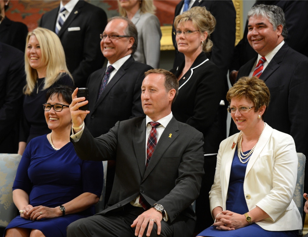 Harper reveals new cabinet, new faces